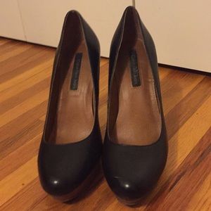 Platformed Calvin Klein shoes.